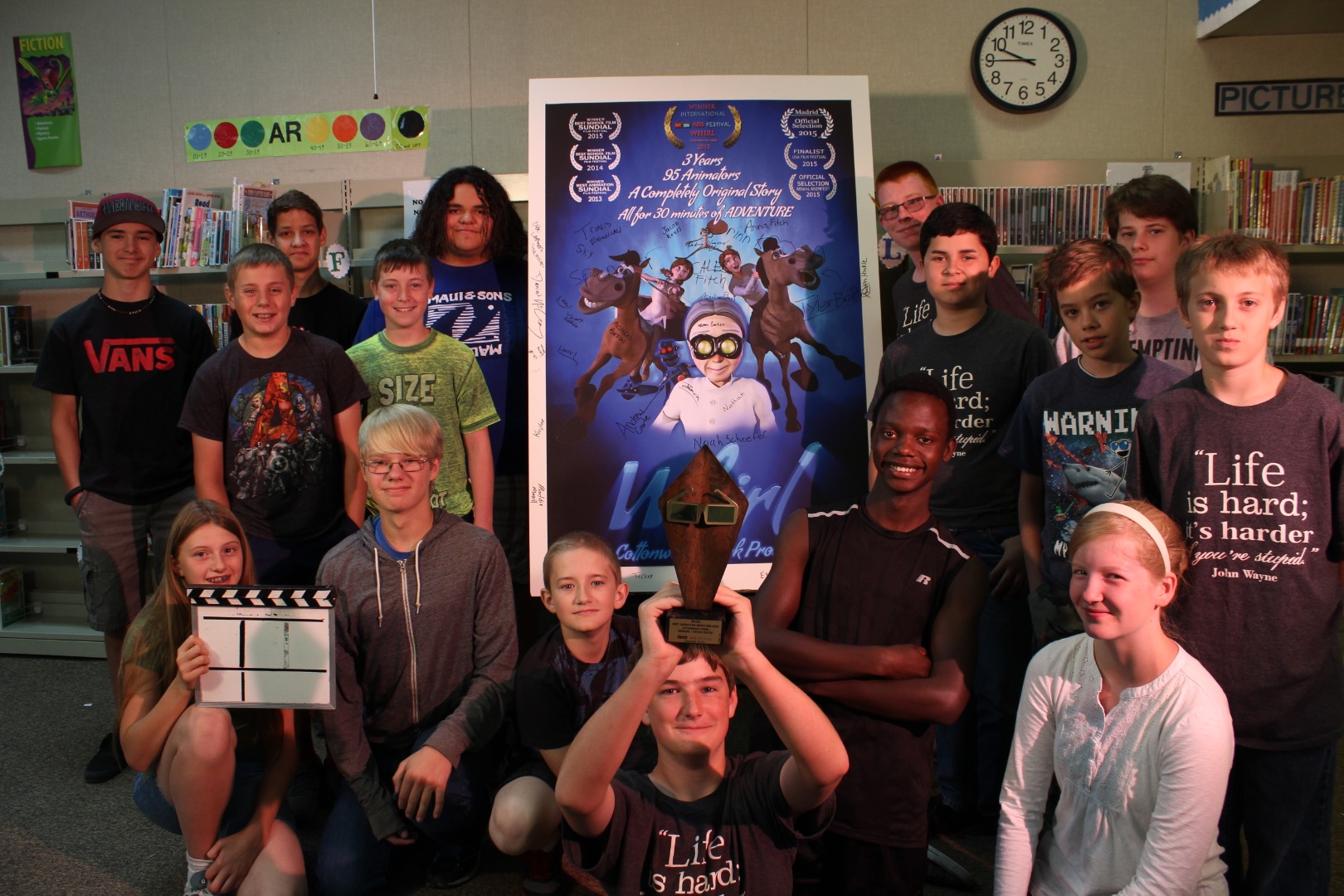 Project Spark kids with award